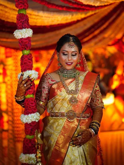 You glow differently when you are happy. This bride is the perfect example, her radiant smile being the best accessory to her traditional wedding attire.