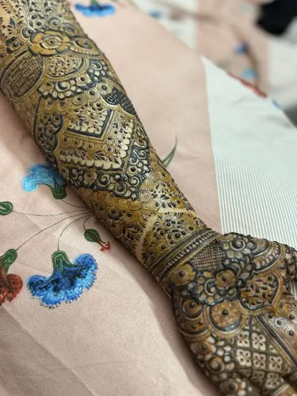 This is a detailed view of my intricate bridal henna work. Each design is unique, combining traditional patterns like paisleys and mandalas with fine-line fillers to create a stunning, full-coverage look for your special day.