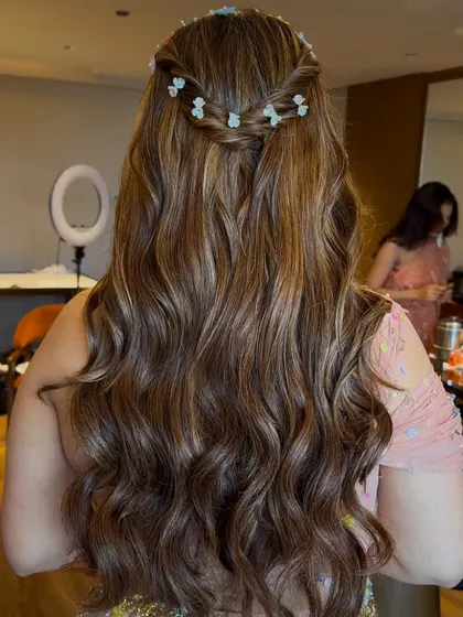 Another angle of the romantic, floral-braid hairstyle.