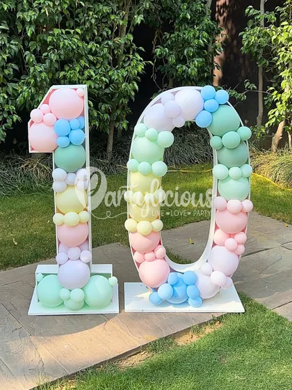A beautiful pastel rainbow balloon mosaic for a 10th birthday, perfectly matching the sweet ice cream theme.