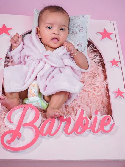 A life-sized Barbie box prop for a fun and trendy photoshoot. This baby is rocking the Barbie look!