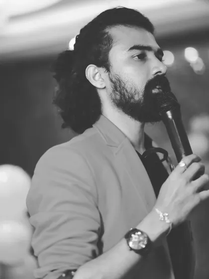 Another angle of me hosting, captured in a timeless black and white photo.