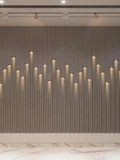 This feature wall was designed for the perfume boutique to create a unique sensory experience. The fluted paneling with candle-like lights creates a visually stunning backdrop that enhances the theme of luxury fragrances.
