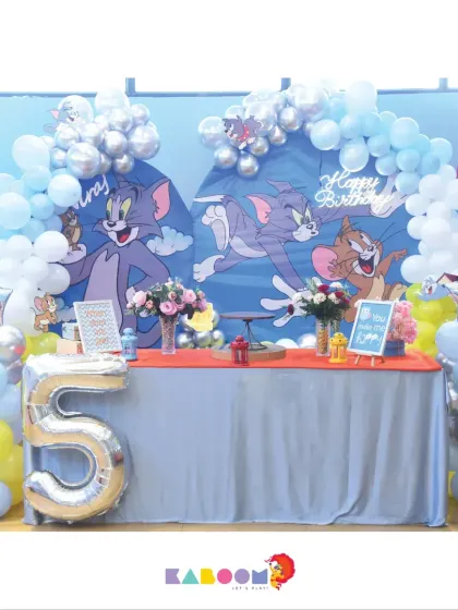 A classic Tom and Jerry themed party! We use fun backdrops and balloon arrangements to bring the timeless chase and friendship to the celebration.