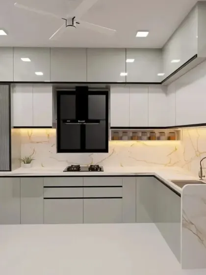 Here is the kitchen in a sophisticated grey and white. All our modular kitchen designs come with a 10-year warranty and are delivered in as fast as 45 days.
