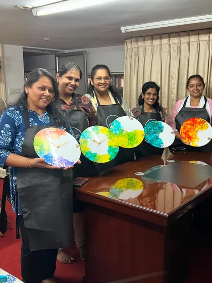 A group of happy creators with their finished alcohol ink clocks. This workshop is always a hit, as everyone leaves with a beautiful and functional piece of art.