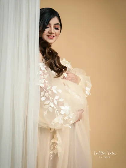 Posing behind a sheer curtain creates a soft, dreamy effect and is a great way to feel comfortable while I capture a beautiful, artistic portrait.