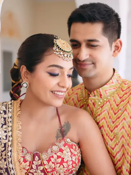 A close-up of Mishi's Mehendi look. We added a pop of purple liner to her eyes to match her dupatta and add a playful touch.