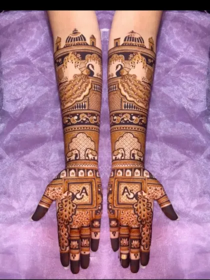 A royal design with peacocks perched on palace architecture and personalized initials on the palms.