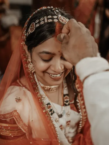 The groom applies the sindoor, a deeply symbolic and emotional moment in a Hindu wedding, which we capture with sensitivity.