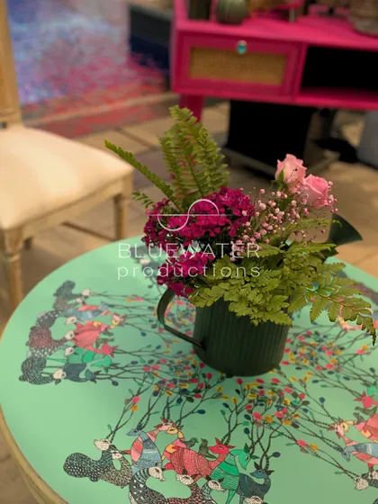 The custom-printed tabletop adds a unique, artistic flair to the event.