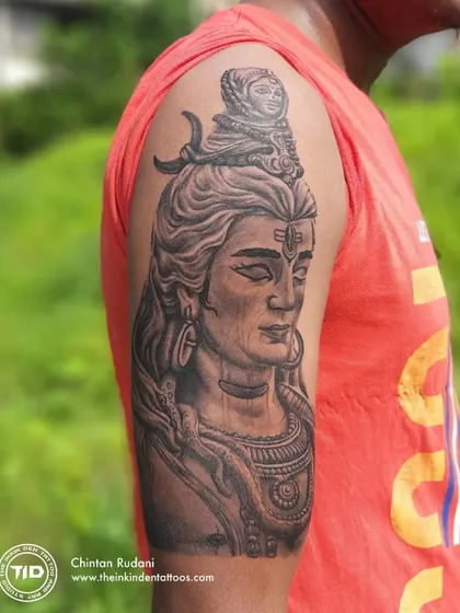 Another angle of the Adiyogi Shiva tattoo, taken outdoors in natural light.