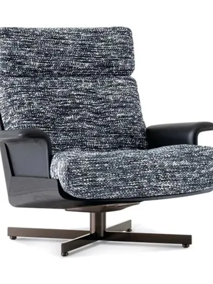This is a variant of our swivel lounge chair, upholstered in a durable, textured black and white fabric. The dark wood accents on the arms and base add a touch of classic elegance.