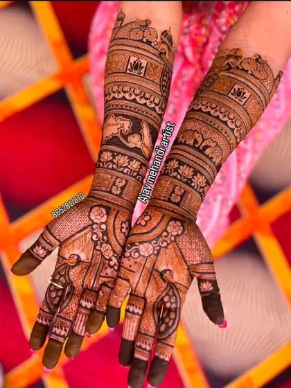 This design features beautiful lotus motifs, a symbol of purity and prosperity. The arms are decorated with bands of elephants and floral patterns.