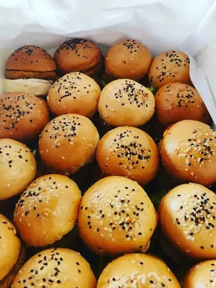 A box full of our freshly made veg sliders, a simple yet satisfying appetizer for any party.