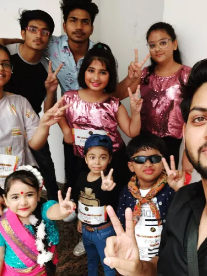 A quick backstage selfie with my students of all ages before a performance. The excitement and team spirit behind the scenes are just as important as the show itself.