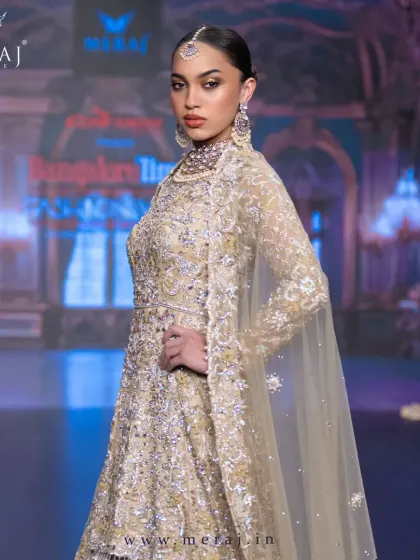 A side view of the Gold Tail Peplum Indo-Western, highlighting its stunning silhouette and intricate embellishments.