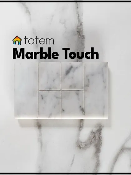 A pristine white marble touch panel, perfect for luxurious and modern interiors. We ensure our technology complements the high-end materials used in your home.