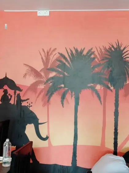 Another angle of the elephant silhouette mural in the restaurant.
