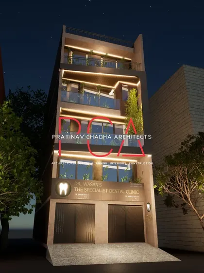 An angled night render of the Mukherjee Nagar residence, highlighting the dynamic, angular projections and their interaction with the lighting.