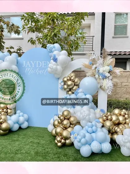 A wider view of the chic outdoor party decor, perfect for a stylish first birthday or baby shower.