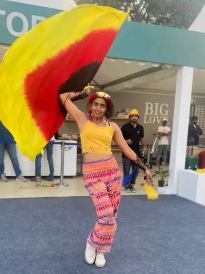 Bringing the colors of JoyTown to life at the BMW India event. Performing at festivals like this allows me to share my passion with a wider audience.