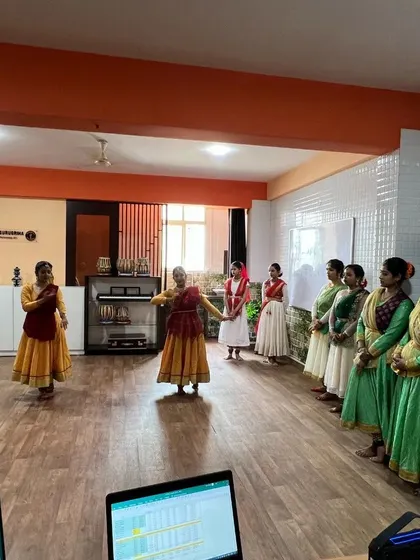 Students performing a piece during their practical exam, with examiners observing from the side.