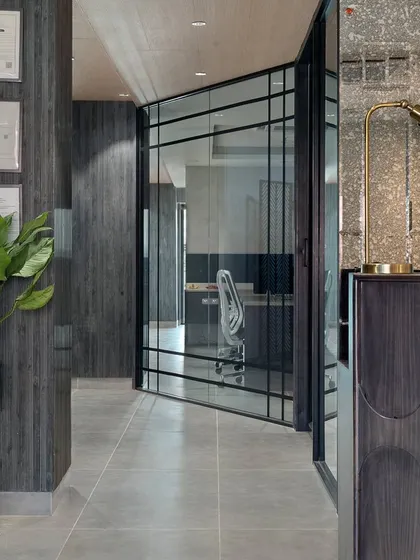 Step into the future of work with this electrifying office design. I used dark wood paneling, glass partitions, and modern furniture to create a space that is sophisticated, dynamic, and inspiring.