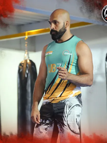 A portrait of Team India's MMA coach, Muneer, at our gym. We believe in collaboration and learning from the best in the sport.