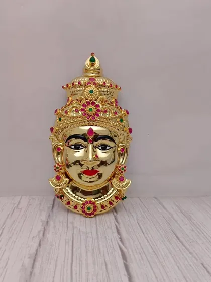 A fully gold-plated Lakshmi face, shining with divine radiance. This Mukhwada is for those who want a completely golden look for the goddess.