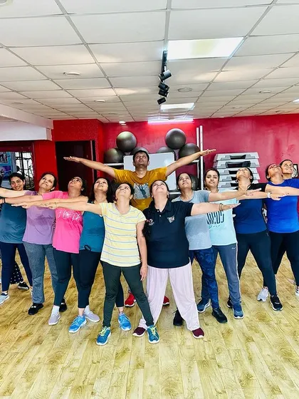 United by dance. A fun group pose showing the unity and spirit of our adult batch.