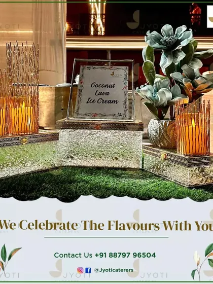 A close-up of our 'Coconut Lava Ice Cream' station, presented on elegant glass blocks with warm, candle-lit decor for a touch of tropical luxury.