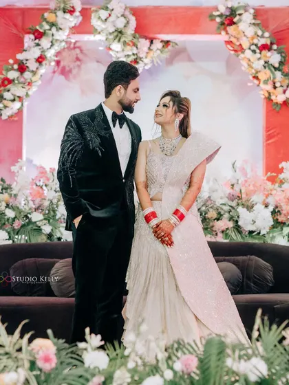 A classic, elegant portrait of the couple at their reception, looking into the distance, ready for their future together.