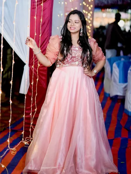 Another full-length shot of the peach Anarkali, showing how it sparkles under the lights.