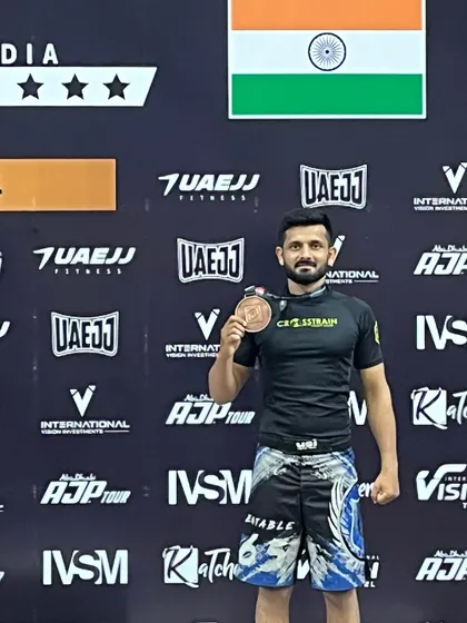 A close-up of one of our fighters with his medal from the AJP Tour. The hard work in the gym pays off on competition day.