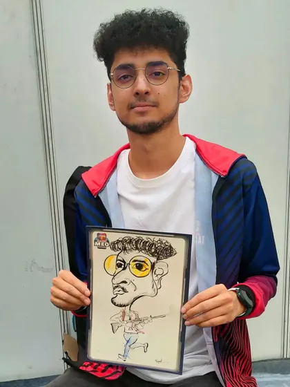 A caricature of a gamer, complete with his gear, created during a Redbull BGMI event.