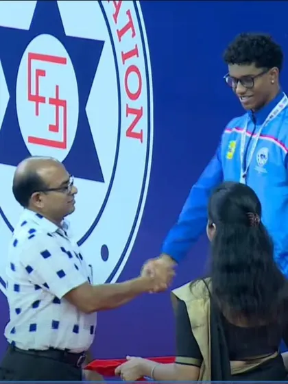 Tanish George Mathew receiving his silver medal for the Men's 100m Freestyle.