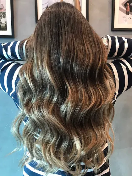 A beautiful balayage using a freelights technique for a soft, natural, sun-kissed glow. Perfect for long hair.