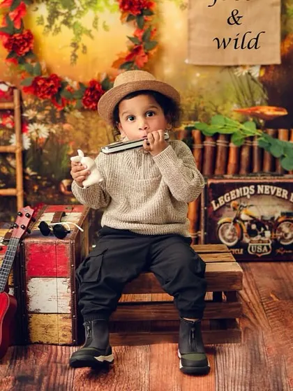 Every explorer needs a harmonica for campfire songs. I love incorporating musical instruments to encourage interaction and capture genuine expressions.