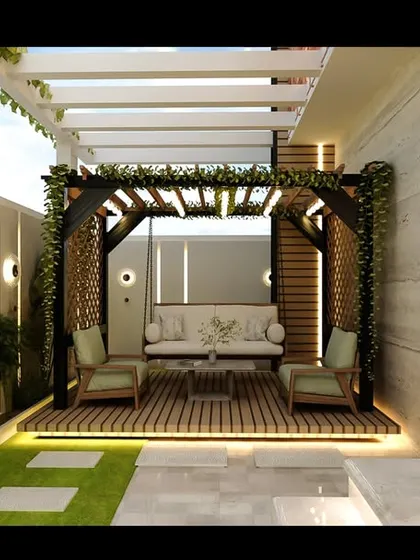 Another angle of the rendered outdoor pergola area, highlighting the comfortable seating arrangement and the ambient lighting that makes it perfect for evening relaxation.