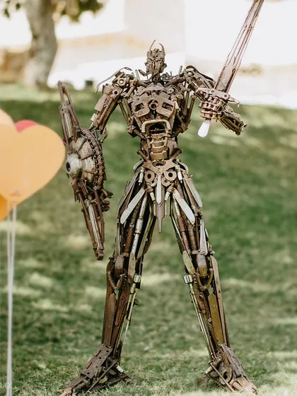 A towering robot warrior, crafted from scrap metal, was another of the incredible art installations that transformed the venue into a surreal festival ground.