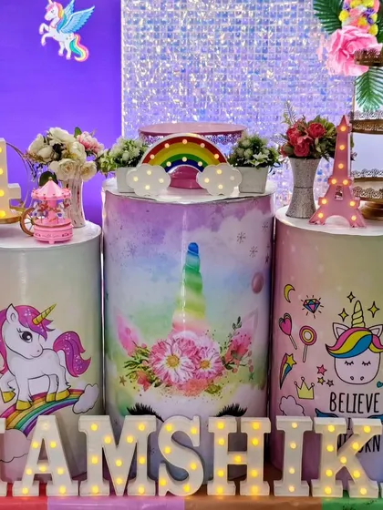 A close-up of the unicorn-themed pedestals.