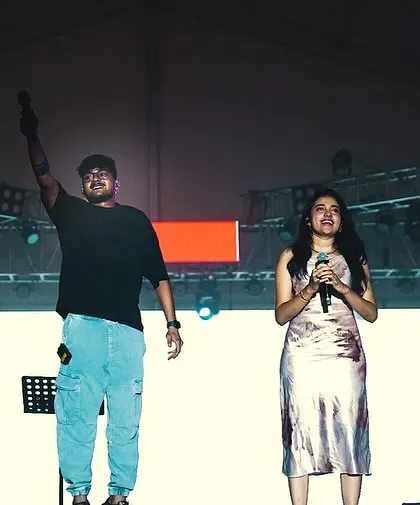On stage with my bandmate from Swaraaha. The connection we share as musicians is what makes our live performances so tight and energetic.