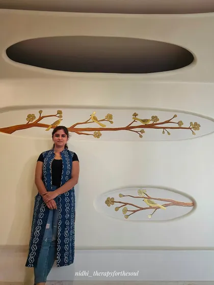 Standing with the finished birds and branches mural. It’s a simple design, but it adds so much elegance and character to the room.