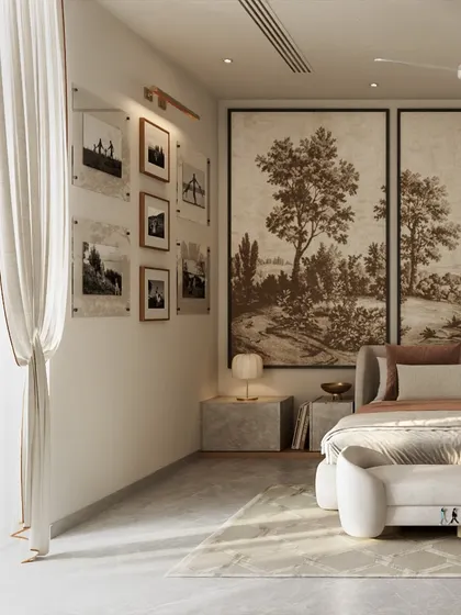 A gallery wall of personal photos adds a layer of individuality to this serene bedroom. The simple frames and black-and-white images complement the room's neutral tones, making the space feel both curated and deeply personal.