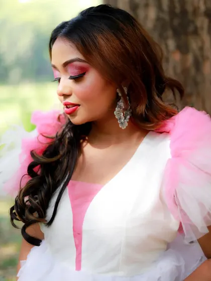 A profile view of the soft glam makeup, showing the seamless blend of the eyeshadow and the glowing skin finish. The look is feminine and perfect for a fantasy-themed shoot.