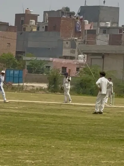 A player in action during the final match. Every run was crucial in this tight contest.