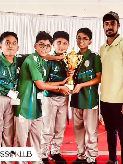 Ahaan Pathak's team celebrates their runner-up trophy at the DPS Bengaluru Interschool Chess Tournament, a fantastic team effort.