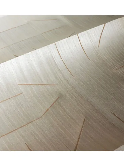 The 'Marqueteries' collection of wallpapers is inspired by the fine craft of wood inlay. This design mimics the grain and pattern of wood, offering a unique, artisanal texture for your walls.