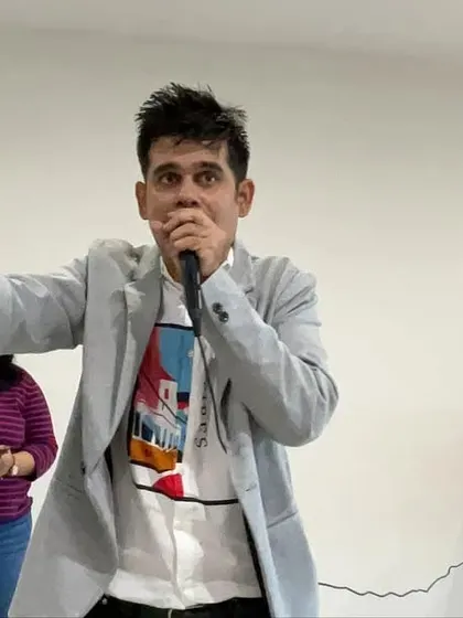 On the mic, directing the teams and keeping the energy high during a corporate event.